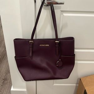 like new michael kors purple purse